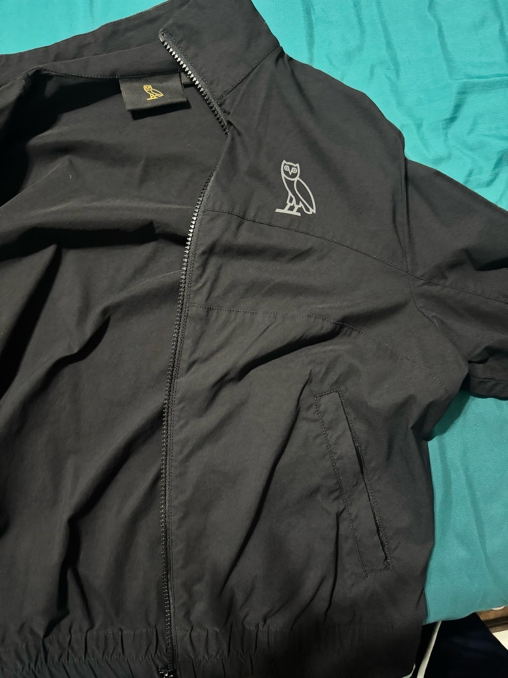 Black Zip-Front Jacket with Owl Logo